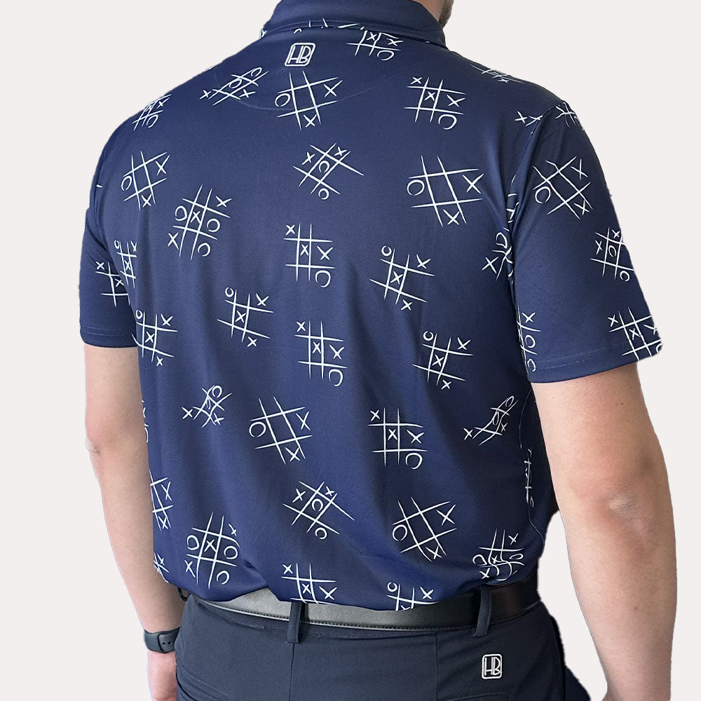 Polo de golf homme Hole Black été léger morpion blanc fond bleu marine