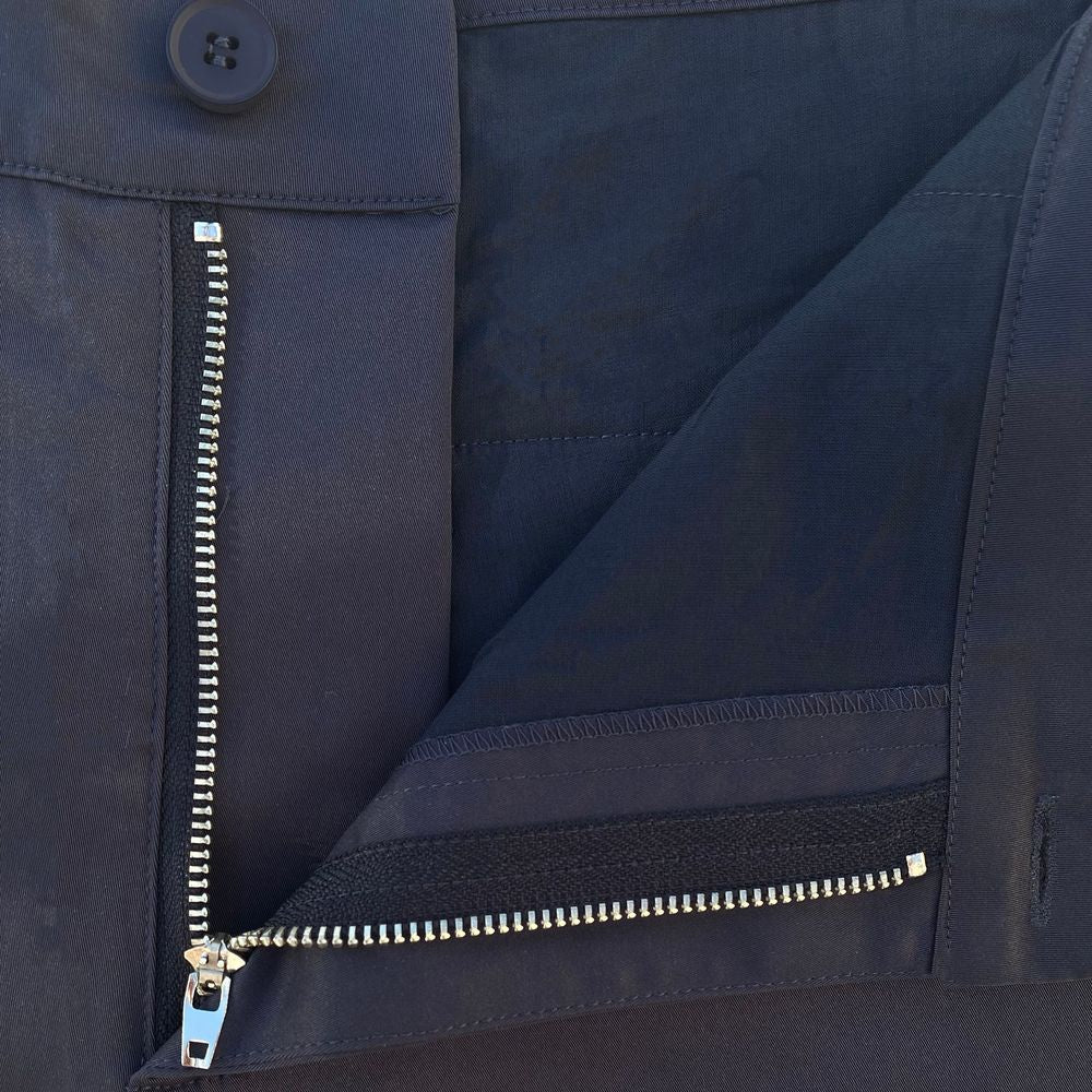 Hole Black Golf zoom sur la fermeture eclair robuste d'un pantalon et bermuda de golf marine