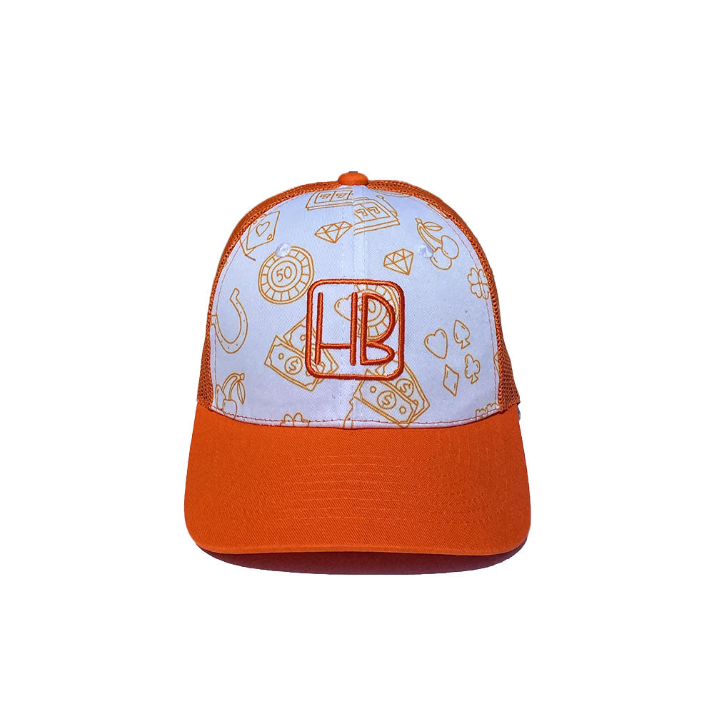 Hole Black Golf Casquette de golf Orange posée sur une table de face