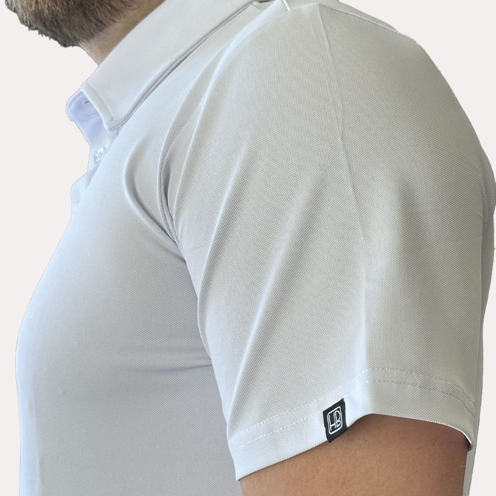 Polo de golf Hole Black été léger vu de coté avec la collerette 